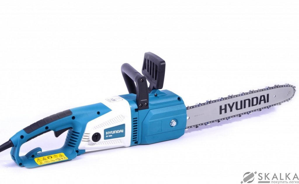 На фото Пила цепная электрическая Hyundai XE 1800