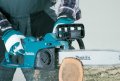 На фото Электропила цепная Makita 1.8 кВт UC4041A (50483)