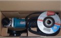 На фото Болгарка Makita GA5030 720 Вт 125 мм (28394)