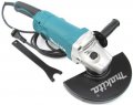 На фото Болгарка Makita GA9050 2000 Вт 230 мм (35050)