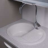 На фото Кухонная мойка Fancy Marble (Буль-Буль) YUTA 620х470х190 белая (102060001)